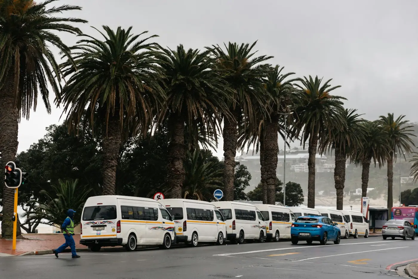 A row of minibuses waiting at a rank